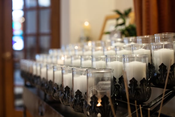rows of votive candles